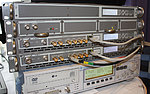 Sestava použitá pro lokální vysílání DVB-T2 (rekordér/generátor ROHDE & SCHWARZ 2083.1302.02 a modul